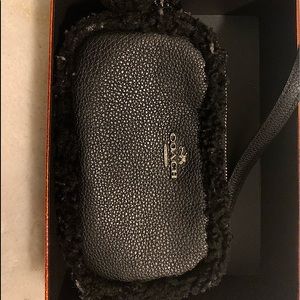 This is an adorable coach clutch barley ever used.